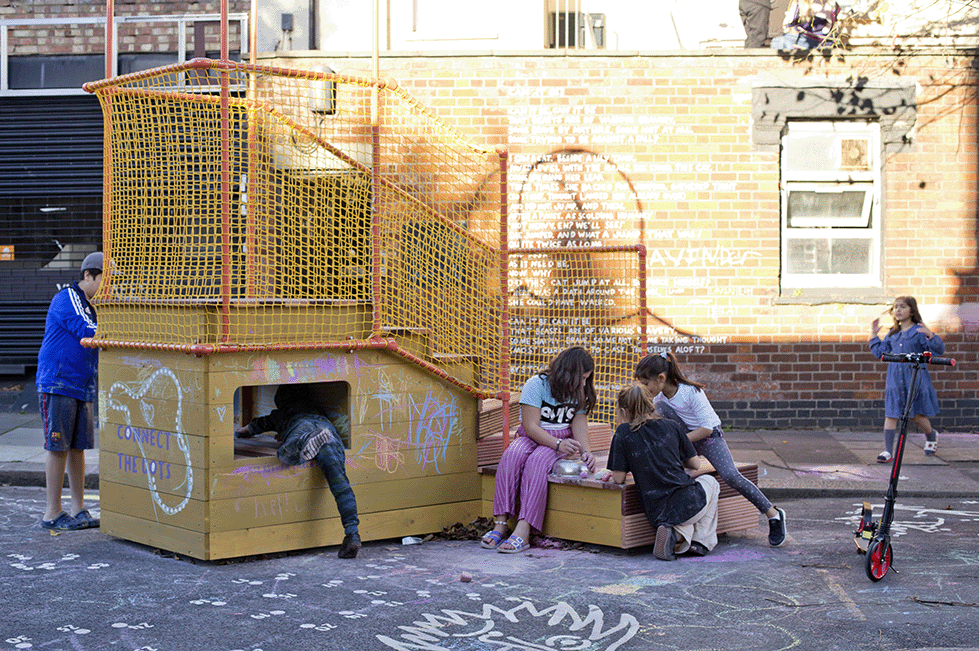 Children playing street furniture